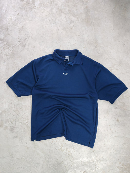 Polo Oakley azul marino con logo blanco | XL